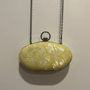 Yellow brocade bag with chain. Excellent used condition.